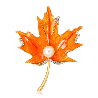 Front product view of the maple leaf brooch pin in gold