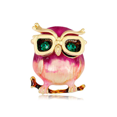 Front product view of the owl brooch pin in gold and red