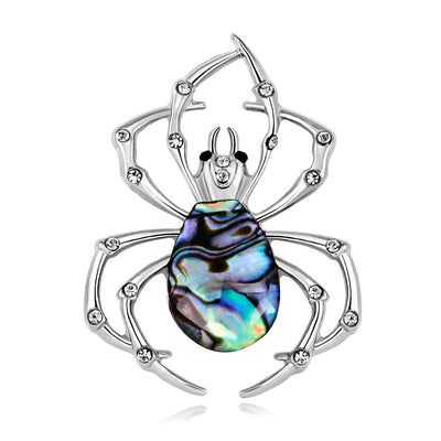 Front product view of the spider brooch pin in silver and blue