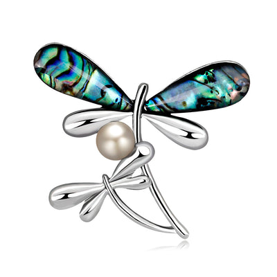 Front product view of the dragonfly brooch pin in silver and black