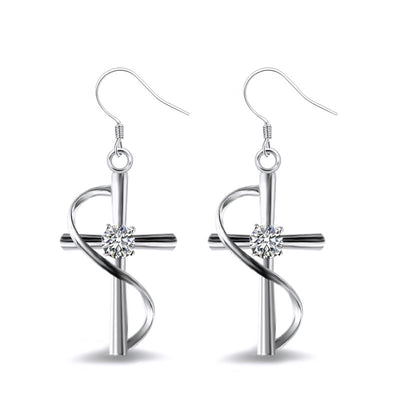 Silver cross swirl clear stone hook earrings on white background