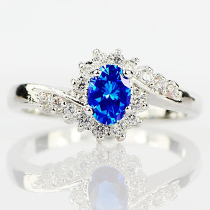Silver-Tone Oval Crystal Halo Ring In Nine Vivid Colors