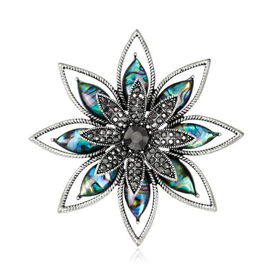 Front product view of the flower brooch pin in silver and black