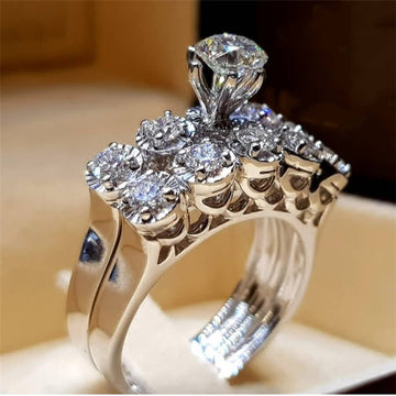 Silver-Tone High Set Round Solitaire Ring With Pave Shoulders
