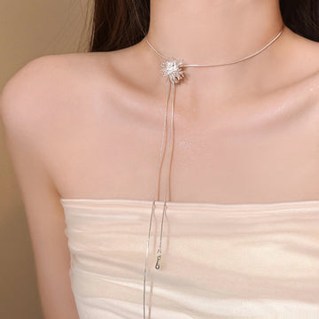 Silver Tone Crystal Burst Pendant Necklace with Long Chain Tassels