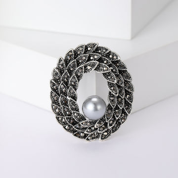 Braided Oval Crystal Brooch With White Pearl Accent