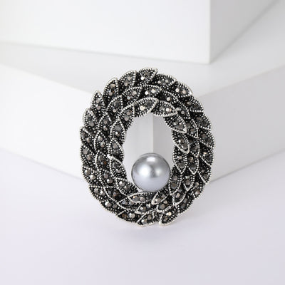 编织椭圆珍珠胸针 shown in product view 1 with visible metal and stone details