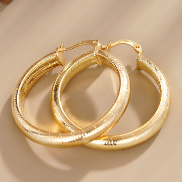Striped Hoop Earrings in Gold-Tone Metal Jewelry Design
