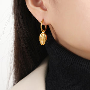 Gold Huggie Hoop Earrings with Cowrie Shell Dangle Charms