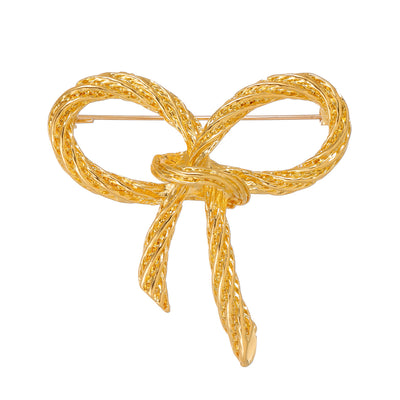 Front product view of the ribbon bow brooch pin in gold