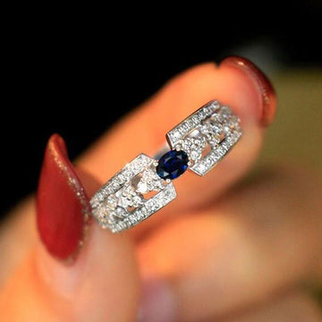 Deep Blue Oval Stone Openwork Clear Stone Ring Silver Tone
