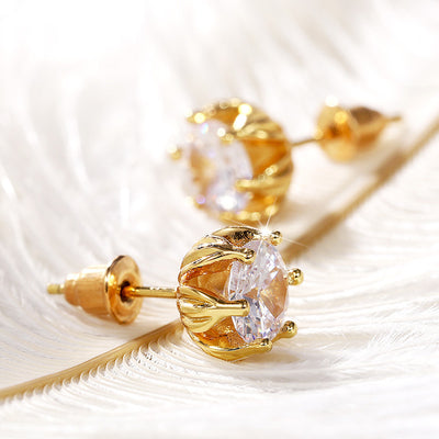 Gold petal-cage clear CZ studs on white feathers showing side posts