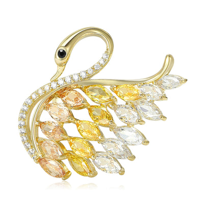 Front view of gold swan brooch with graduated crystal feathers decorative metal pin
