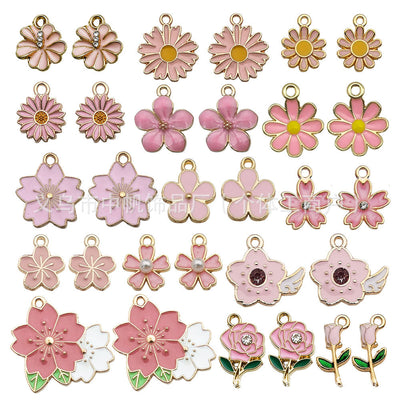 Colorful flower charms arranged on a light background