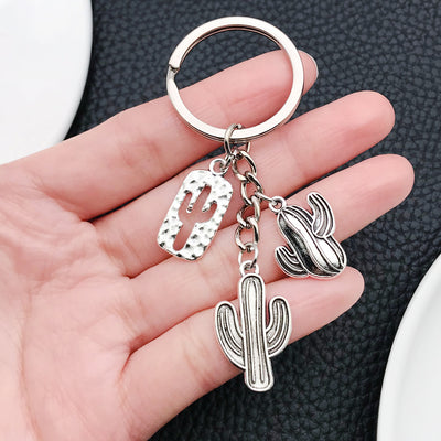 Overview showing the available color and design variations of the antique silver cactus boot and horse metal keychain