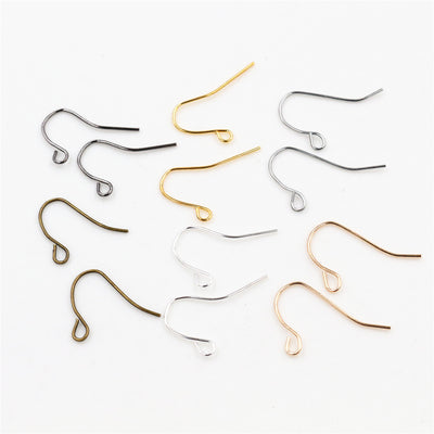 Overview of classic fishhook wires with a ball and attachment loop in six finishes on a light background