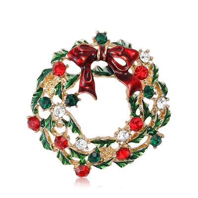 Enamel Holiday Wreath Bow Brooch shown against a white display background