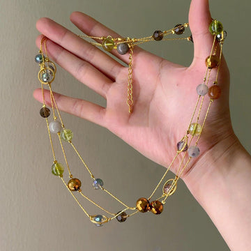 Blue Green and Amber Tone Beaded Long Necklace With Polished Metal Details