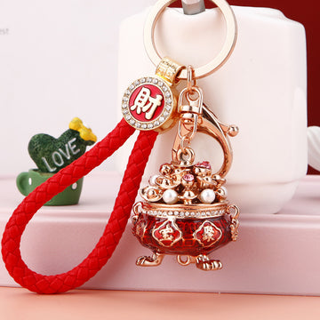 Pearl Filled Treasure Bowl Keychains in Red Gold and Purple