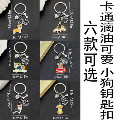Front product photo of cartoon dog paw bone and heart enamel keychain showing the pictured design arrangement