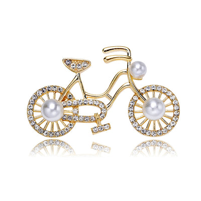 Front product view of the bicycle brooch pin in gold and silver