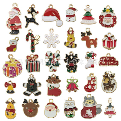 Colorful bell and reindeer charms arranged on a light background