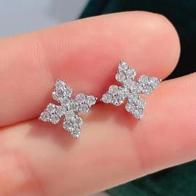 Silver Tone four petal cluster studs shown in front detail view
