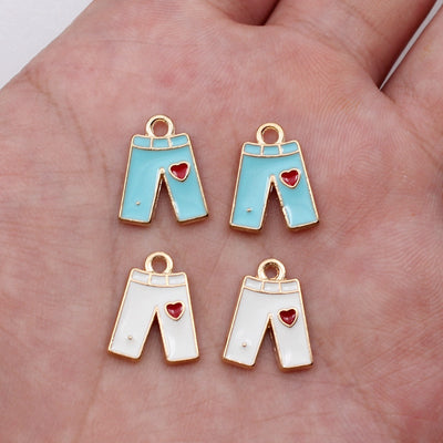 Hand held view of shorts charms
