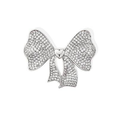 Front view of the crystal bow metal brooch