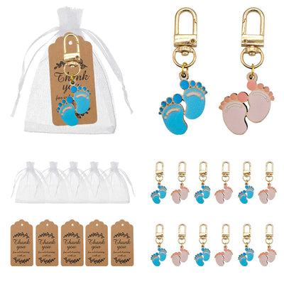 Blue and pink wooden baby feet keychains with bags and tags