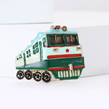 Green Enamel Locomotive Brooch With Red and Black Details