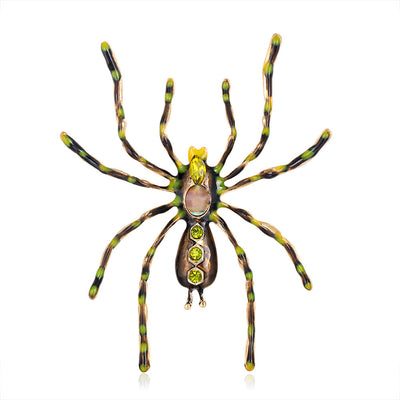 Front product view of the spider brooch pin in gold and yellow