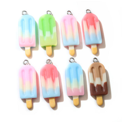 Ice pop charms arranged assortment on a white background