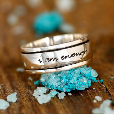 Antique silver spinner ring with i am enough text on turquoise crystals