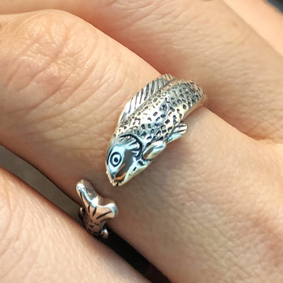 Close antique silver koi fish ring finger wear scale detail