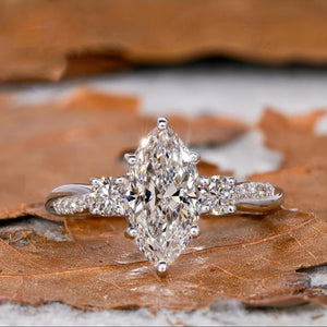 Marquise Solitaire Three-Stone Ring In Polished Silver Tone