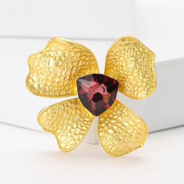 Hammered Gold Tone Flower Brooch With Deep Red Crystal Center