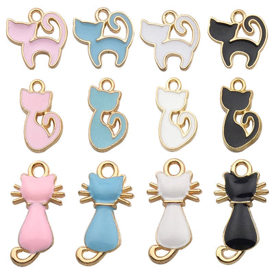 Colorful cat charms pictured with visible surface details