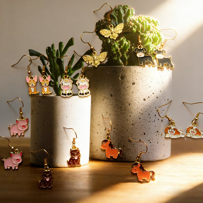 Main product view of gold Tone Farm Animal Drop Earrings in Eight Designs
