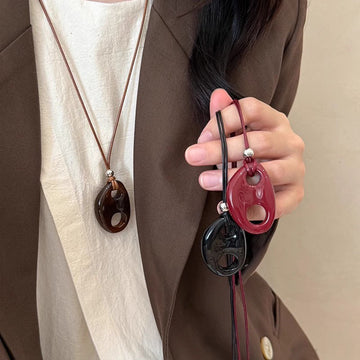 Oval Cutout Resin Pendant Long Cord Necklace in Two Colors