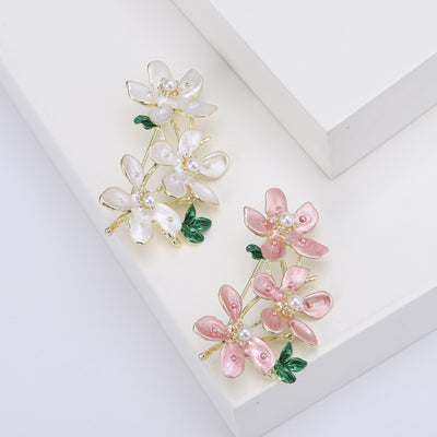 Three Flower Pearl Enamel Brooch isolated front view
