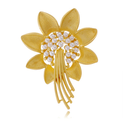 Front view of the gold sunflower metal brooch