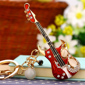 Guitar and Auspicious Charm Keychains in Twelve Pictured Designs