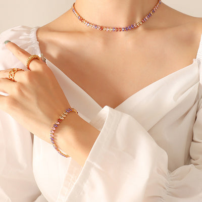 Model wearing multicolor oval zircon tennis choker and matching bracelet