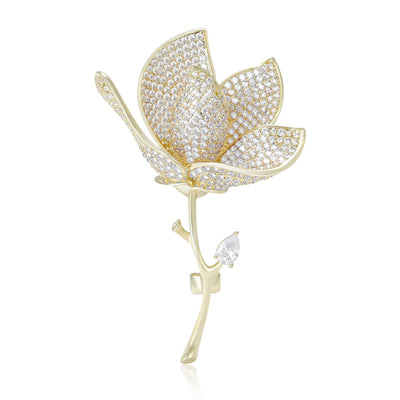 Clear pavé magnolia flower stem brooch gold tone front