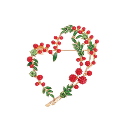 Front product view of the heart brooch pin in red and green