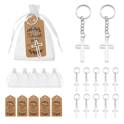 Cross keychains displayed beside white organza bags and brown thank-you tags.