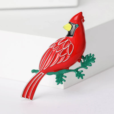 Main front view of Red Cardinal Bird Brooch With Green Branch Enamel Detail