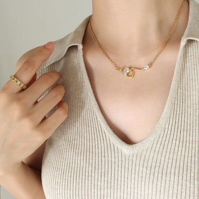 Model wearing gold root branch zircon pendant necklace