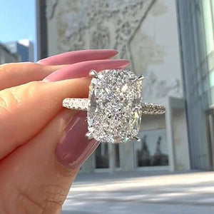 Oversized Radiant Rectangular Clear Solitaire Ring With Pave Band